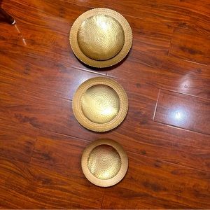 Round metal set of three wall decor. Set them up anyway you like.